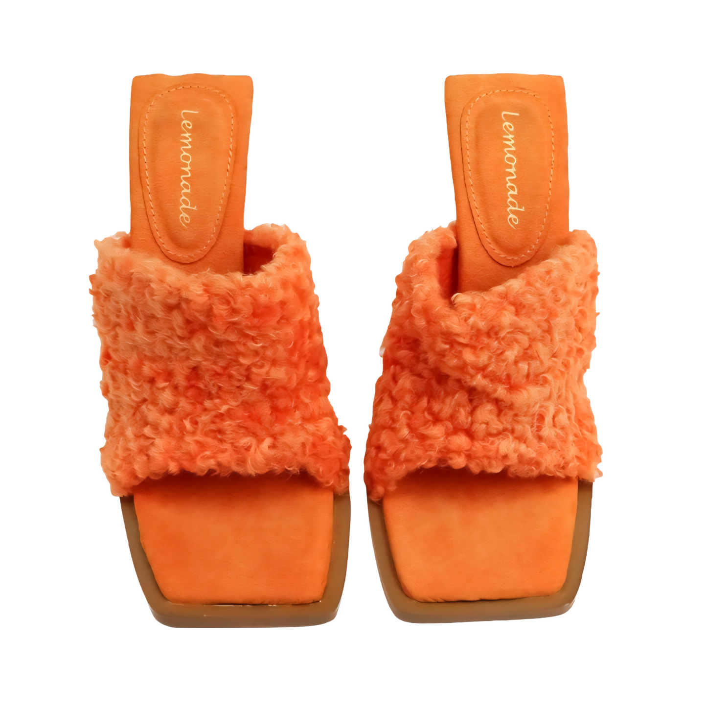 Pair of orange slippers with fuzzy texture on a white background