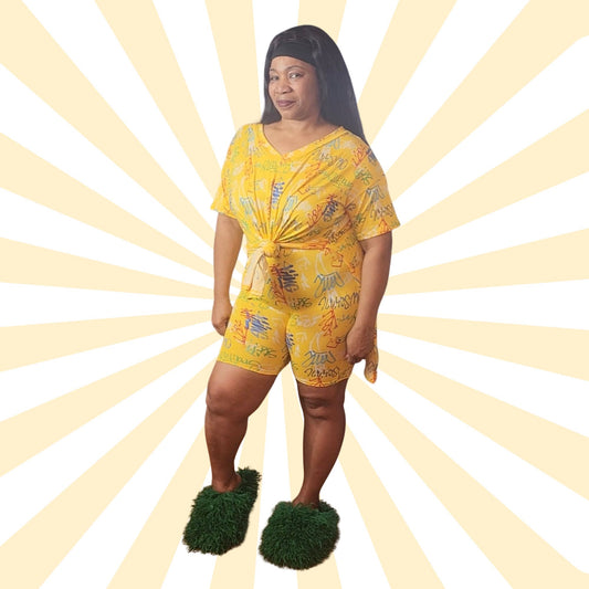 Woman wearing a yellow patterned outfit with green shoes on a sunburst background